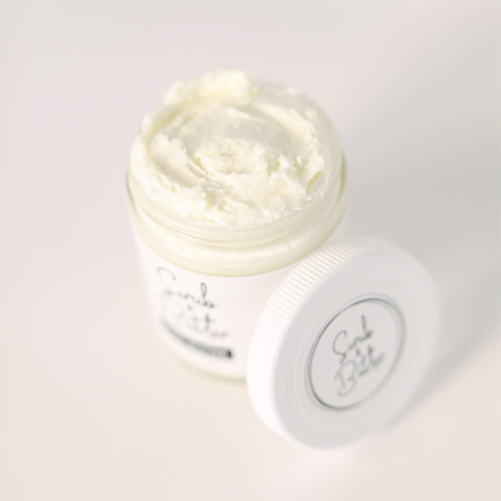 Body Butter by Scrub & Butter is available in a 8 fl oz | 227ml jar. It is lightweight, non-greasy, and nourishing.