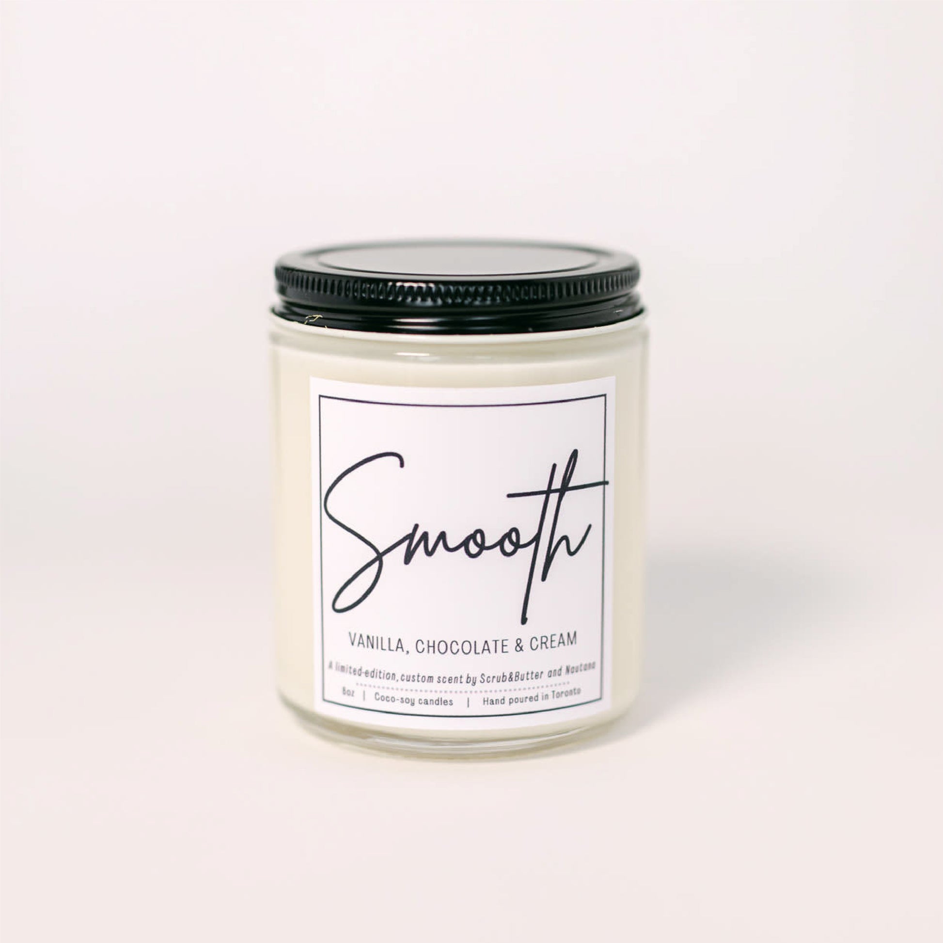 Scrub & Butter x NAUTANA Co. Candle is available in 8oz - up to 40 hours of burn time. It is a limited-edition candle with a blissful blend of Vanilla, Chocolate & Cream.
