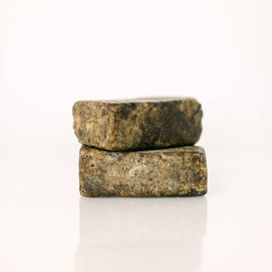 Black Soap Face + Body by Scrub & Butter is 3.2oz | 90.7g. It  enhances skin tone, treats Eczema, and has anti-inflammatory properties.